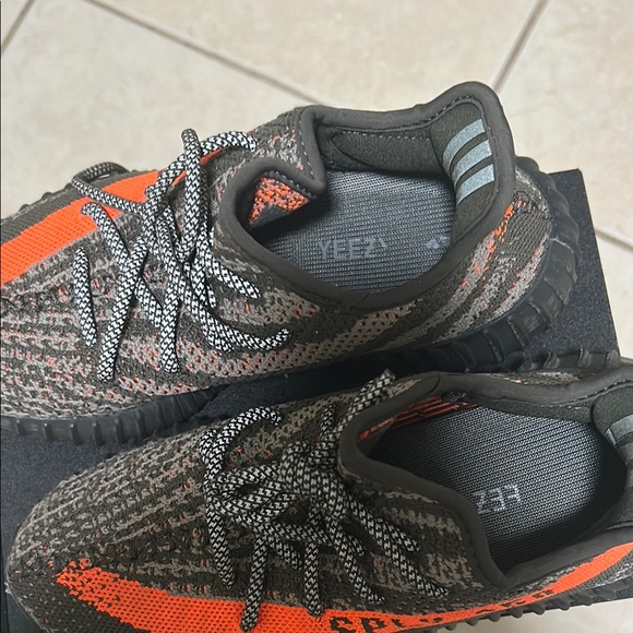 Yeezy Black and Orange Sneakers with Boost Cushioning - Picture 2 of 6